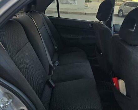 Серый Мицубиси Лансер, объемом двигателя 1.58 л и пробегом 150 тыс. км за 5200 $, фото 5 на Automoto.ua