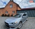 Серый Мицубиси Лансер, объемом двигателя 2 л и пробегом 290 тыс. км за 7100 $, фото 1 на Automoto.ua