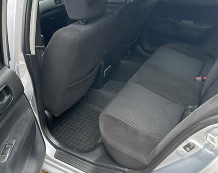 Сірий Міцубісі Lancer, об'ємом двигуна 1.59 л та пробігом 219 тис. км за 4500 $, фото 15 на Automoto.ua