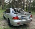 Серый Мицубиси Лансер, объемом двигателя 1.6 л и пробегом 270 тыс. км за 4599 $, фото 1 на Automoto.ua