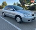 Сірий Міцубісі Lancer, об'ємом двигуна 1.6 л та пробігом 153 тис. км за 3999 $, фото 1 на Automoto.ua