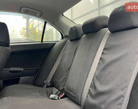 Серый Мицубиси Лансер, объемом двигателя 1.5 л и пробегом 239 тыс. км за 6000 $, фото 18 на Automoto.ua