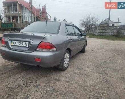 Сірий Міцубісі Lancer, об'ємом двигуна 1.6 л та пробігом 440 тис. км за 4200 $, фото 2 на Automoto.ua