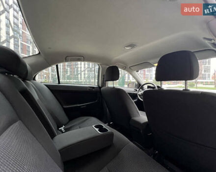 Сірий Міцубісі Lancer, об'ємом двигуна 1.5 л та пробігом 173 тис. км за 4800 $, фото 19 на Automoto.ua