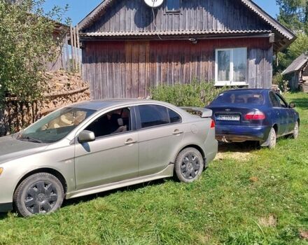 Серый Мицубиси Лансер, объемом двигателя 1.5 л и пробегом 166 тыс. км за 5500 $, фото 3 на Automoto.ua