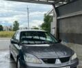 Сірий Міцубісі Lancer, об'ємом двигуна 1.58 л та пробігом 171 тис. км за 2500 $, фото 1 на Automoto.ua