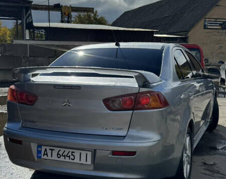 Серый Мицубиси Лансер, объемом двигателя 2 л и пробегом 190 тыс. км за 6900 $, фото 20 на Automoto.ua