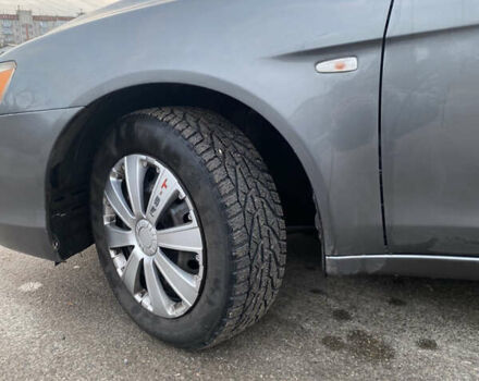 Серый Мицубиси Лансер, объемом двигателя 1.5 л и пробегом 255 тыс. км за 6500 $, фото 10 на Automoto.ua