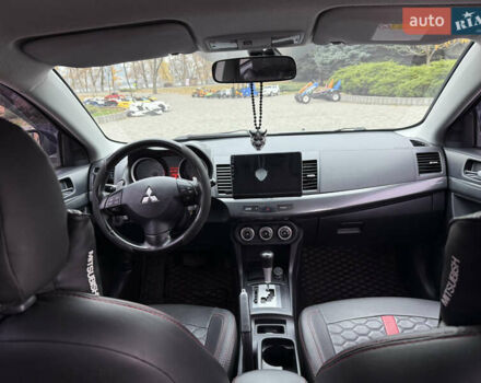 Сірий Міцубісі Lancer, об'ємом двигуна 2 л та пробігом 253 тис. км за 8700 $, фото 37 на Automoto.ua