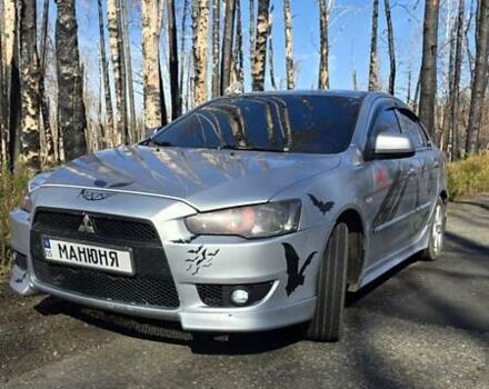 Серый Мицубиси Лансер, объемом двигателя 1.5 л и пробегом 360 тыс. км за 6500 $, фото 1 на Automoto.ua