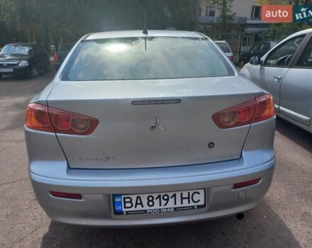 Серый Мицубиси Лансер, объемом двигателя 2 л и пробегом 103 тыс. км за 7700 $, фото 7 на Automoto.ua