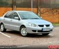 Серый Мицубиси Лансер, объемом двигателя 1.6 л и пробегом 340 тыс. км за 6500 $, фото 1 на Automoto.ua