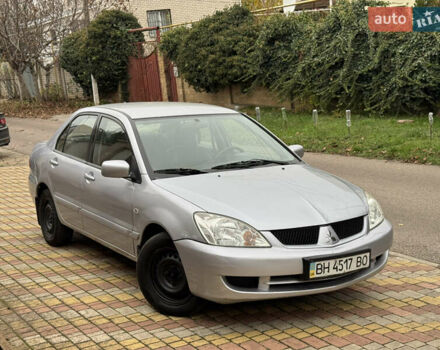 Сірий Міцубісі Lancer, об'ємом двигуна 1.6 л та пробігом 221 тис. км за 3650 $, фото 11 на Automoto.ua
