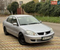 Сірий Міцубісі Lancer, об'ємом двигуна 1.6 л та пробігом 221 тис. км за 3650 $, фото 11 на Automoto.ua
