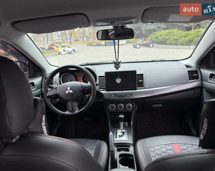 Сірий Міцубісі Lancer, об'ємом двигуна 2 л та пробігом 253 тис. км за 8700 $, фото 38 на Automoto.ua