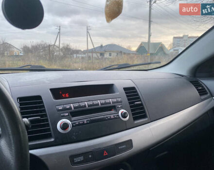 Серый Мицубиси Лансер, объемом двигателя 1.5 л и пробегом 255 тыс. км за 6500 $, фото 21 на Automoto.ua