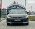 Сірий Міцубісі Lancer, об'ємом двигуна 1.5 л та пробігом 235 тис. км за 6399 $, фото 1 на Automoto.ua