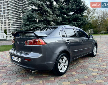 Серый Мицубиси Лансер, объемом двигателя 2 л и пробегом 212 тыс. км за 6000 $, фото 11 на Automoto.ua