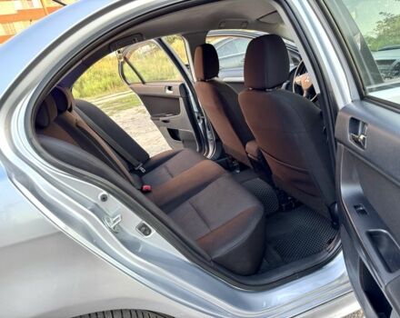 Серый Мицубиси Лансер, объемом двигателя 2 л и пробегом 223 тыс. км за 6890 $, фото 15 на Automoto.ua