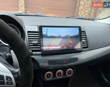 Сірий Міцубісі Lancer, об'ємом двигуна 2 л та пробігом 92 тис. км за 8200 $, фото 59 на Automoto.ua