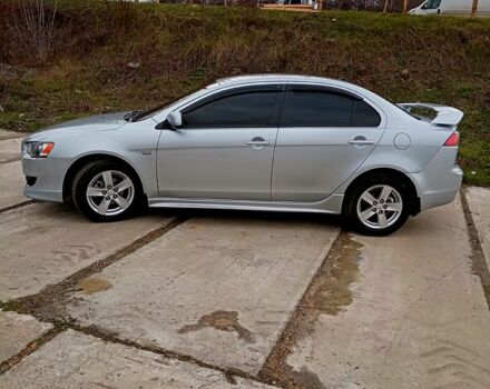 Серый Мицубиси Лансер, объемом двигателя 2 л и пробегом 243 тыс. км за 5500 $, фото 2 на Automoto.ua