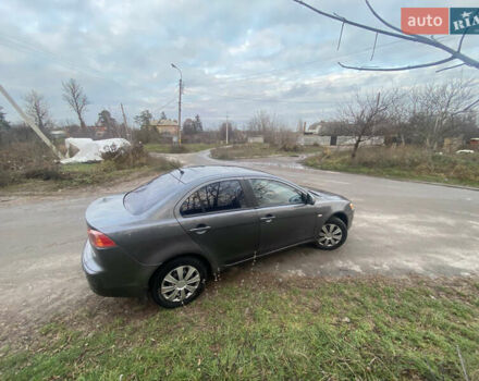 Серый Мицубиси Лансер, объемом двигателя 1.5 л и пробегом 255 тыс. км за 6500 $, фото 18 на Automoto.ua