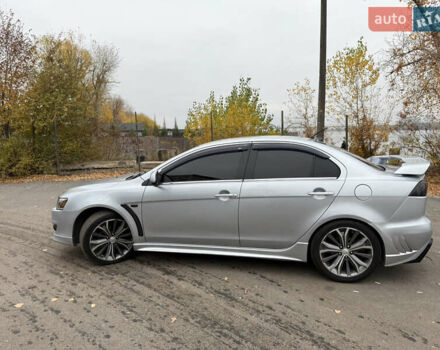 Сірий Міцубісі Lancer, об'ємом двигуна 2 л та пробігом 253 тис. км за 8700 $, фото 5 на Automoto.ua