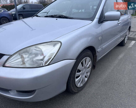 Серый Мицубиси Лансер, объемом двигателя 1.58 л и пробегом 330 тыс. км за 3500 $, фото 16 на Automoto.ua