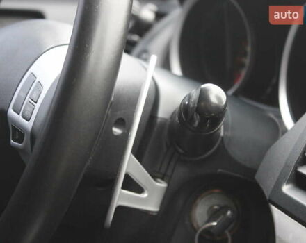 Серый Мицубиси Лансер, объемом двигателя 2 л и пробегом 146 тыс. км за 8300 $, фото 18 на Automoto.ua