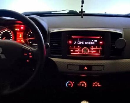 Серый Мицубиси Лансер, объемом двигателя 1.5 л и пробегом 230 тыс. км за 6300 $, фото 9 на Automoto.ua