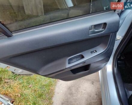 Серый Мицубиси Лансер, объемом двигателя 2 л и пробегом 234 тыс. км за 7200 $, фото 20 на Automoto.ua