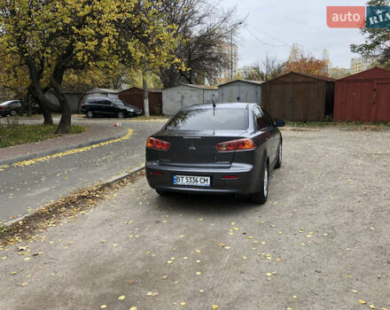 Сірий Міцубісі Lancer, об'ємом двигуна 2 л та пробігом 187 тис. км за 8000 $, фото 13 на Automoto.ua