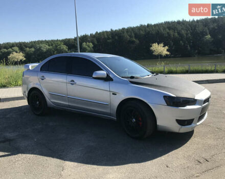 Серый Мицубиси Лансер, объемом двигателя 2 л и пробегом 256 тыс. км за 7000 $, фото 2 на Automoto.ua