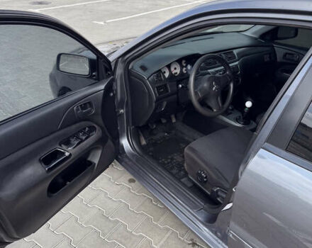 Серый Мицубиси Лансер, объемом двигателя 1.58 л и пробегом 250 тыс. км за 4300 $, фото 15 на Automoto.ua