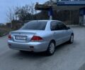 Сірий Міцубісі Lancer, об'ємом двигуна 1.6 л та пробігом 180 тис. км за 3900 $, фото 2 на Automoto.ua