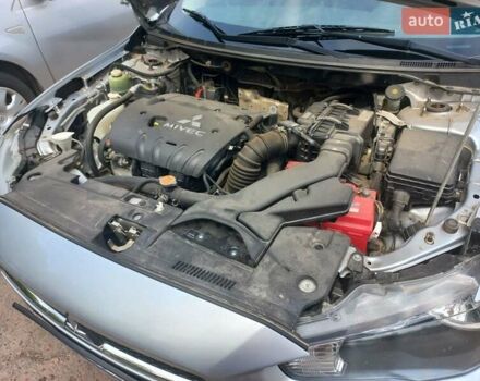 Серый Мицубиси Лансер, объемом двигателя 2 л и пробегом 103 тыс. км за 7700 $, фото 10 на Automoto.ua