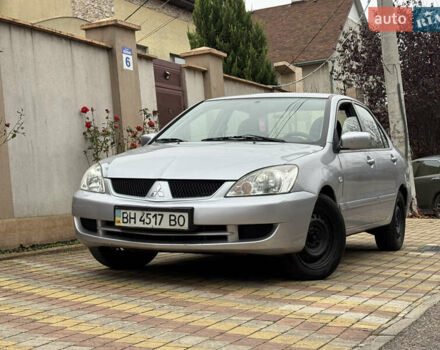 Сірий Міцубісі Lancer, об'ємом двигуна 1.6 л та пробігом 221 тис. км за 3650 $, фото 1 на Automoto.ua