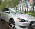 Серый Мицубиси Лансер, объемом двигателя 1.5 л и пробегом 280 тыс. км за 6900 $, фото 1 на Automoto.ua