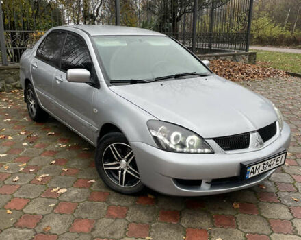 Сірий Міцубісі Lancer, об'ємом двигуна 1.59 л та пробігом 219 тис. км за 4500 $, фото 3 на Automoto.ua