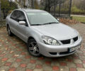 Сірий Міцубісі Lancer, об'ємом двигуна 1.59 л та пробігом 219 тис. км за 4500 $, фото 3 на Automoto.ua