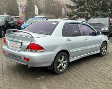 Серый Мицубиси Лансер, объемом двигателя 1.6 л и пробегом 205 тыс. км за 5400 $, фото 6 на Automoto.ua