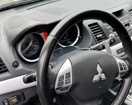 Сірий Міцубісі Lancer, об'ємом двигуна 2 л та пробігом 230 тис. км за 6800 $, фото 27 на Automoto.ua