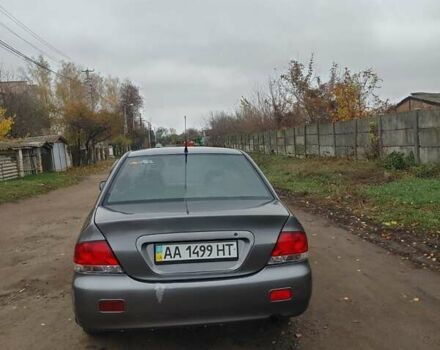 Сірий Міцубісі Lancer, об'ємом двигуна 1.58 л та пробігом 1 тис. км за 2850 $, фото 4 на Automoto.ua