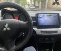 Серый Мицубиси Лансер, объемом двигателя 1.5 л и пробегом 195 тыс. км за 6100 $, фото 4 на Automoto.ua