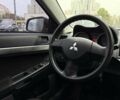 Сірий Міцубісі Lancer, об'ємом двигуна 1.5 л та пробігом 233 тис. км за 5890 $, фото 14 на Automoto.ua