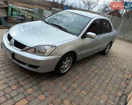 Серый Мицубиси Лансер, объемом двигателя 1.58 л и пробегом 185 тыс. км за 4700 $, фото 15 на Automoto.ua