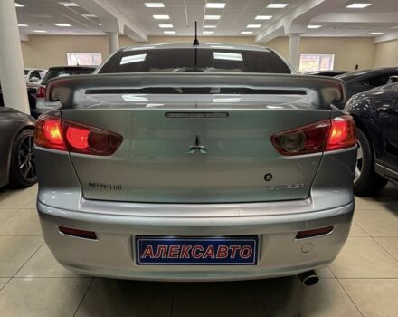 Серый Мицубиси Лансер, объемом двигателя 1.5 л и пробегом 241 тыс. км за 6400 $, фото 2 на Automoto.ua