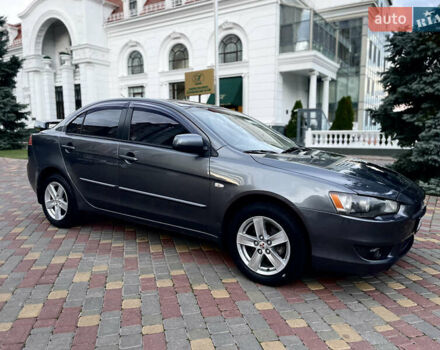 Серый Мицубиси Лансер, объемом двигателя 2 л и пробегом 212 тыс. км за 6000 $, фото 14 на Automoto.ua