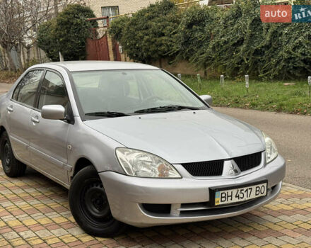 Сірий Міцубісі Lancer, об'ємом двигуна 1.6 л та пробігом 221 тис. км за 3650 $, фото 8 на Automoto.ua