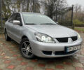 Сірий Міцубісі Lancer, об'ємом двигуна 1.59 л та пробігом 219 тис. км за 4500 $, фото 1 на Automoto.ua
